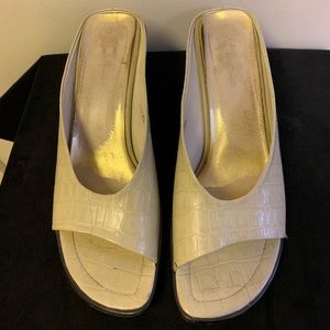 Sassy leather sandals w/diagonal slant across toes